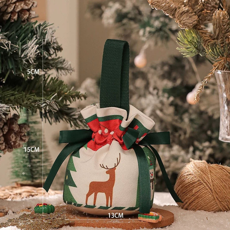 Green round-base Christmas apple gift bag with a loop handle and a visible 13 cm base-width label