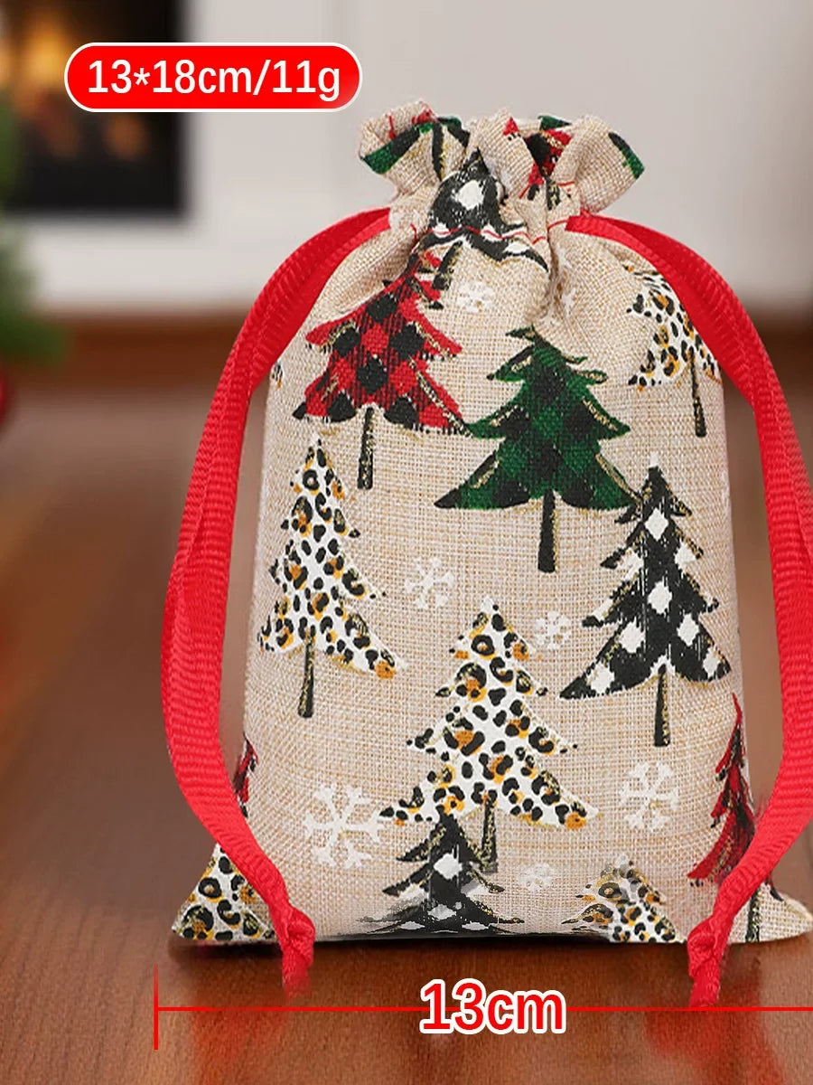 Burlap-look Christmas tree drawstring gift bag shown closed on a tabletop
