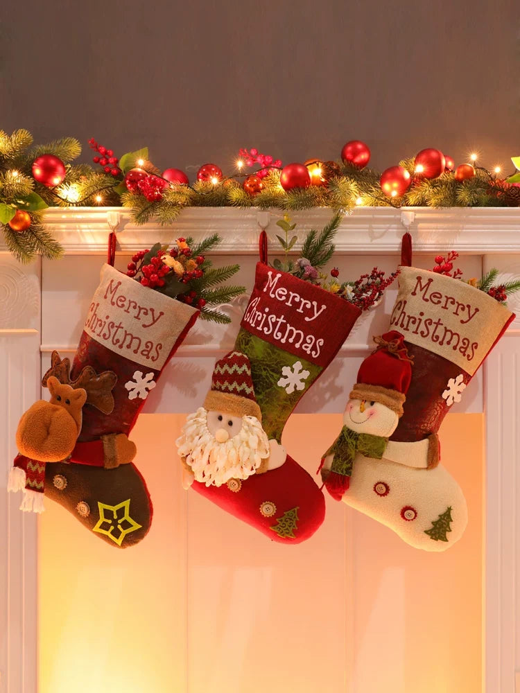 Three dimensional Christmas stockings arranged together on a decorated mantel display