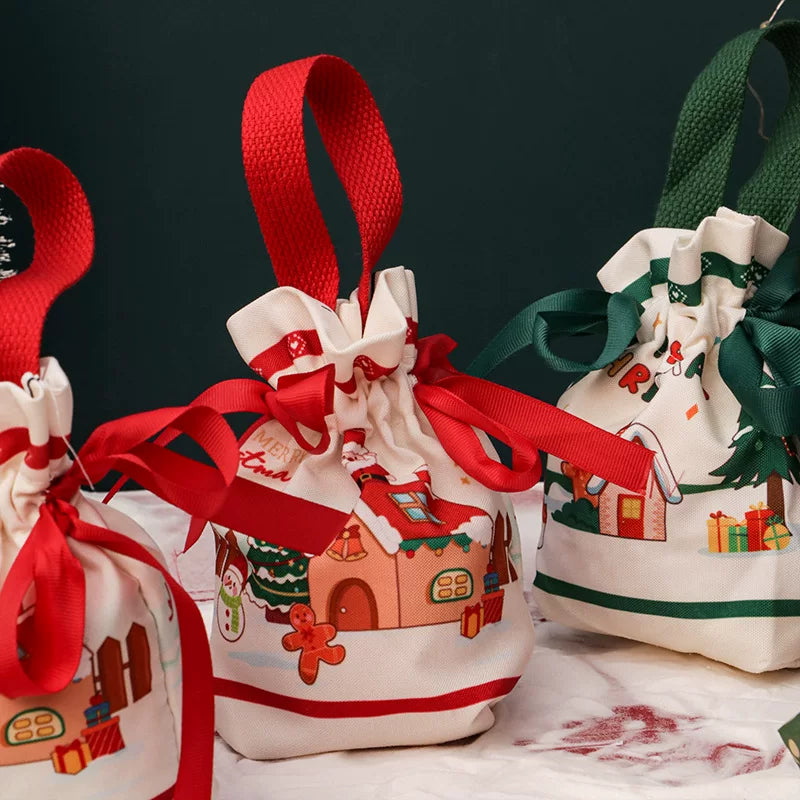 Canvas Christmas carry gift bags with gathered tops, ribbon ties and loop handles
