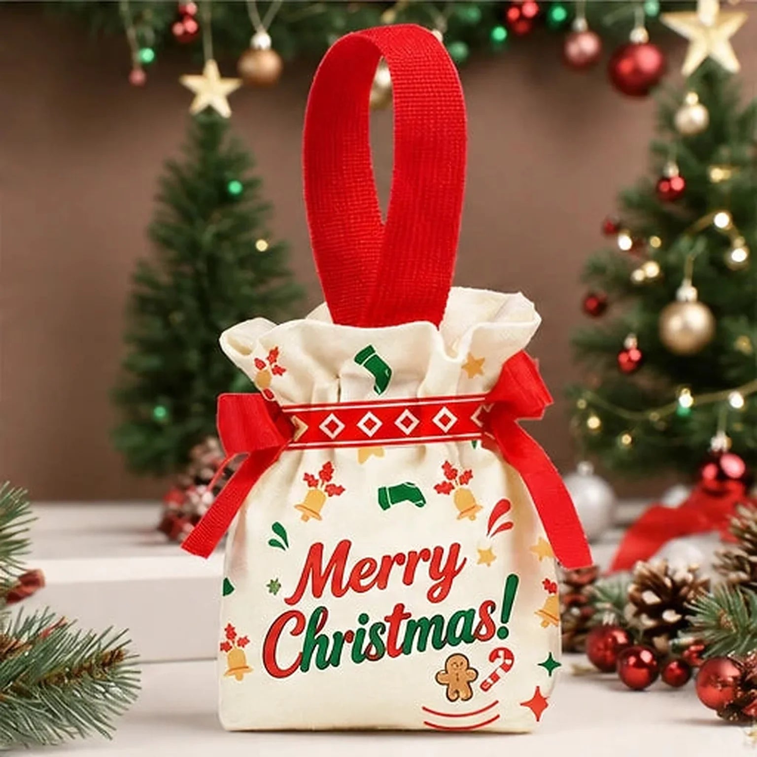 Small red canvas Christmas drawstring gift bag with loop handle