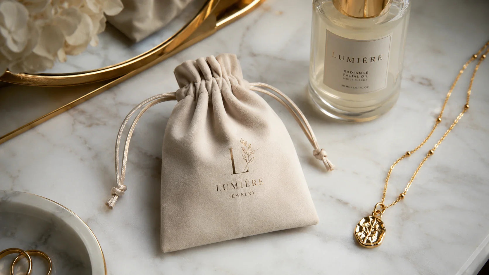 Luxurious custom logo drawstring jewelry bags used for premium retail unboxing experience.