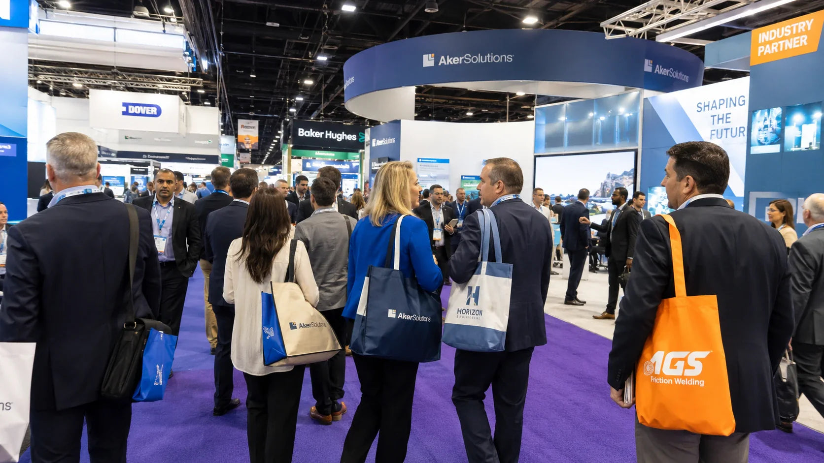 Professionals carrying custom printed tote bags at a busy trade show