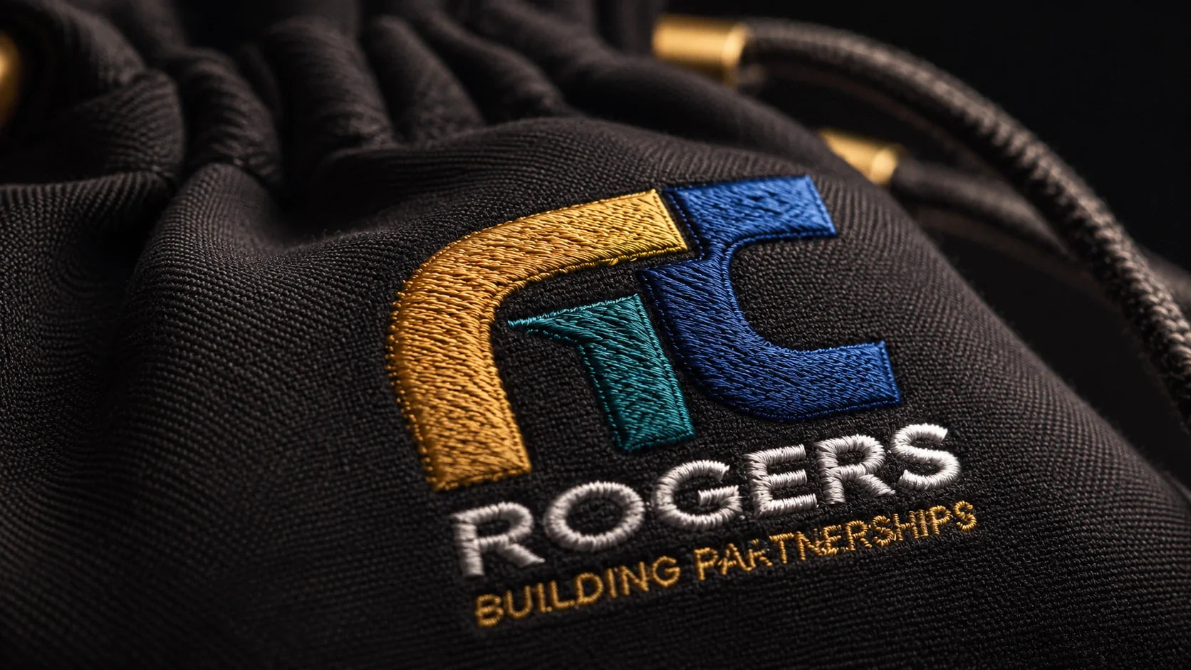 Macro close up showing the premium texture of a personalised embroidered drawstring bag.
