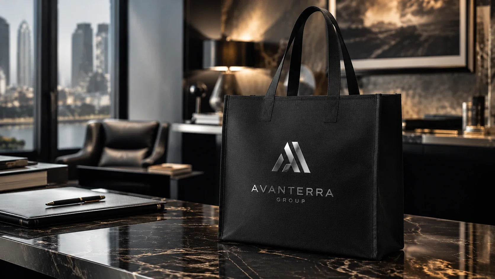 A premium black non woven bag featuring a metallic silver corporate logo.