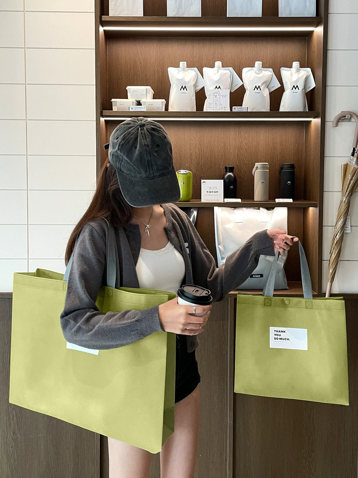 Matcha green snap-button non-woven tote bags for boutique packaging