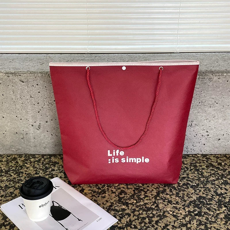 Printed Ankara Red Life Is Simple trapezoid non-woven tote bag