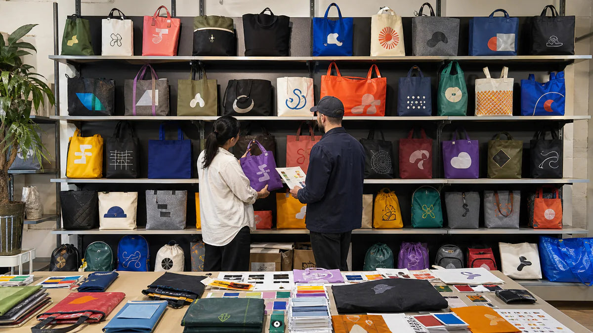 Large factory sample library showing diverse custom tote materials, colors, structures and decoration methods