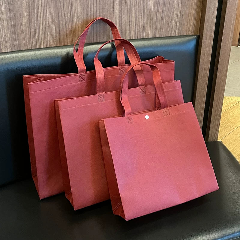 Plain Ankara red non-woven snap tote bag