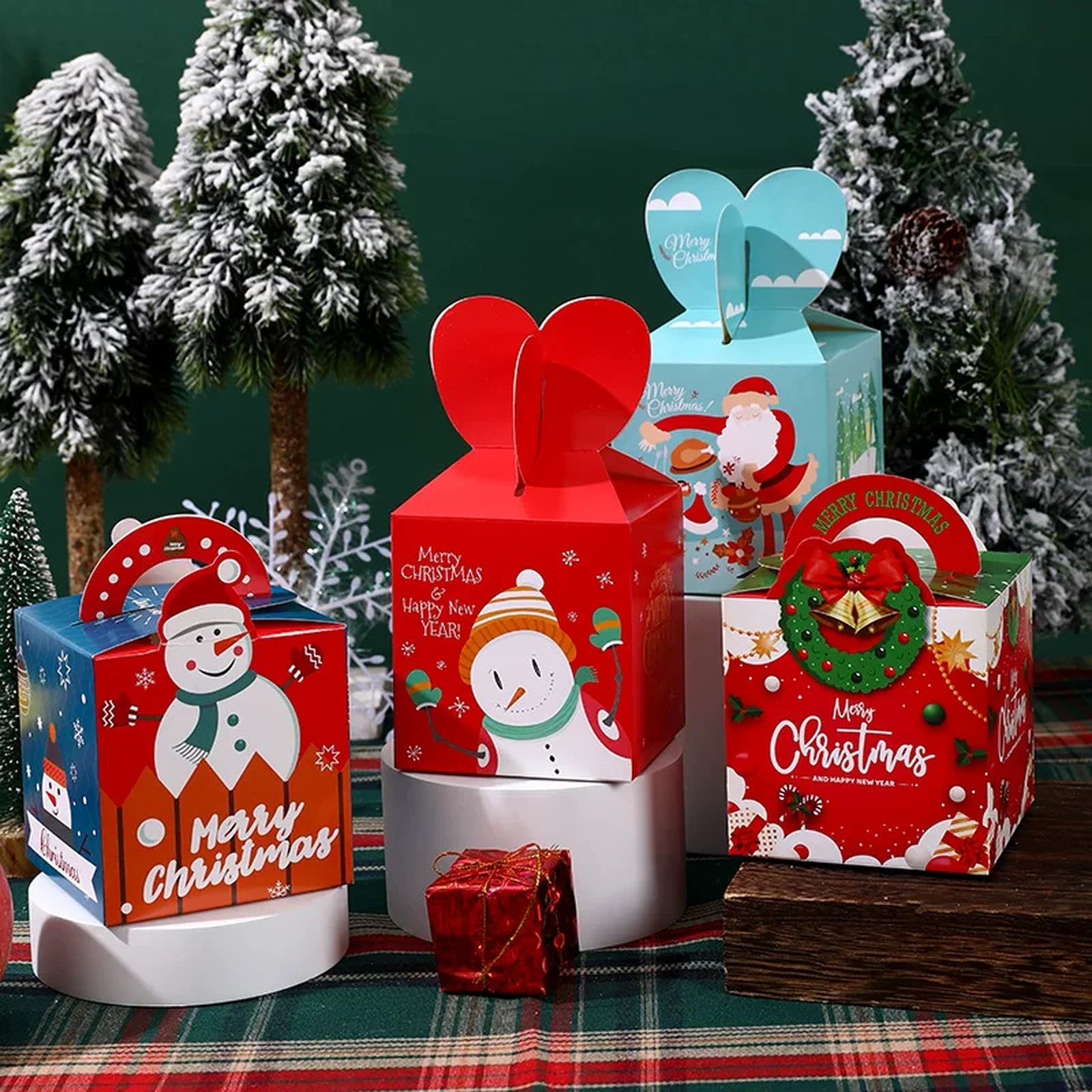 Assorted Christmas cardstock treat boxes displayed for holiday gifting