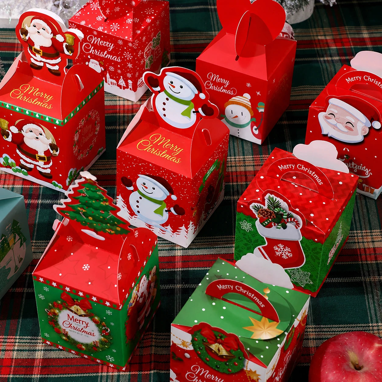 Assorted Christmas cardstock treat boxes with integrated handles