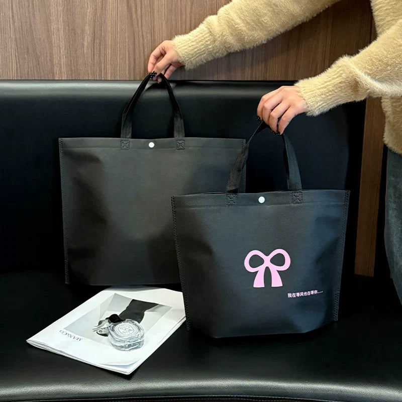 Black bow printed non-woven tote bag