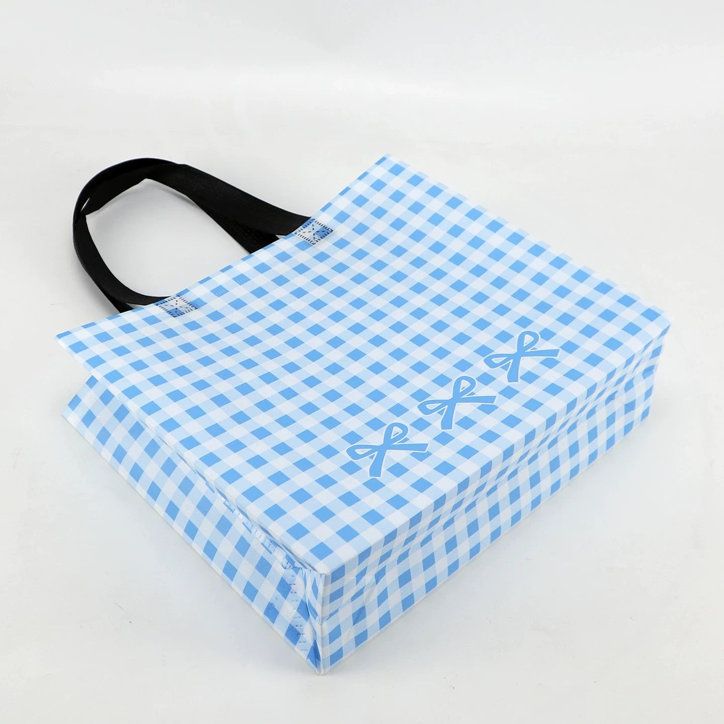 Blue plaid non-woven tote bag folded construction