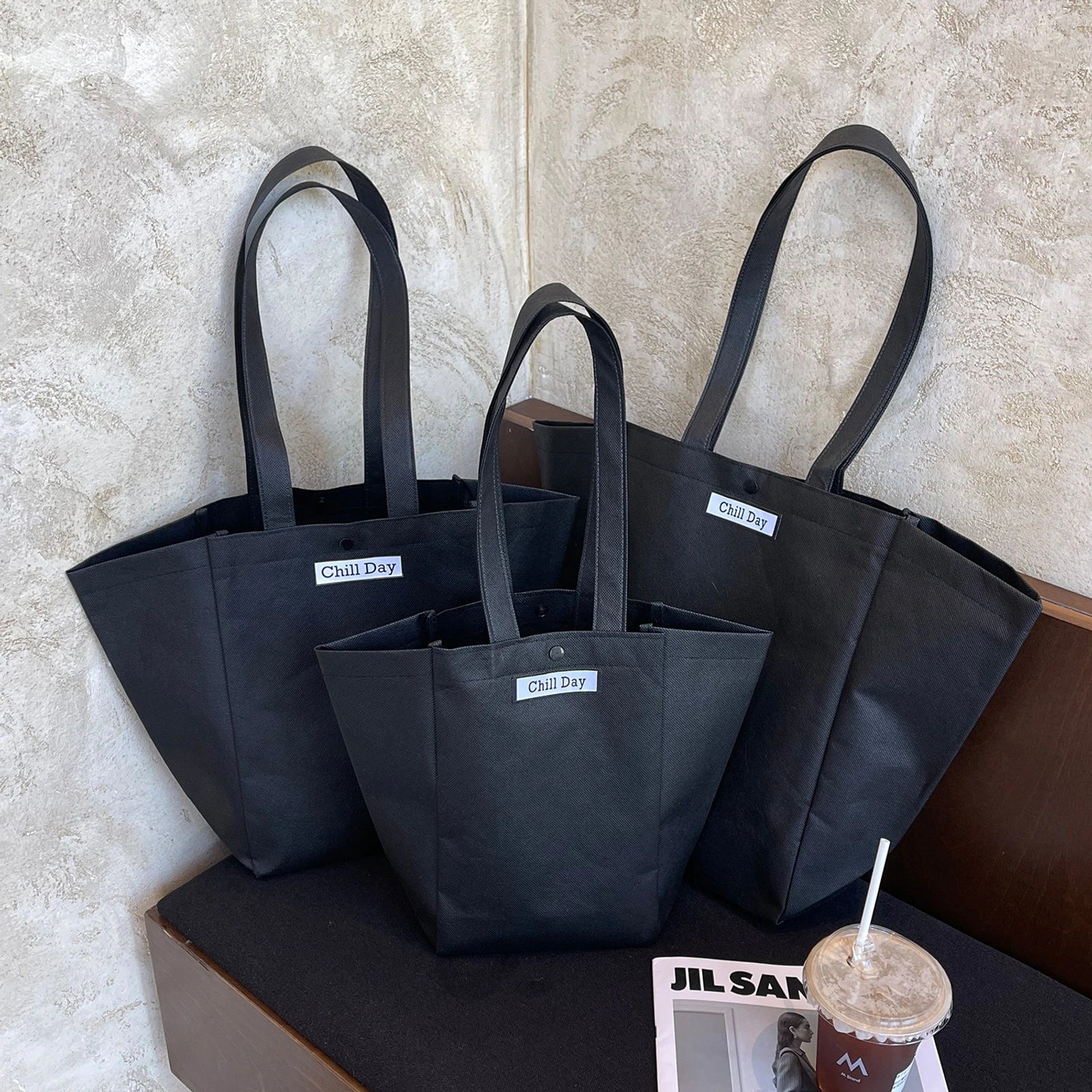 Boutique Non-Woven Tote Bags — 6 Styles — Black Trapezoid Tote+Woven Label Patch
