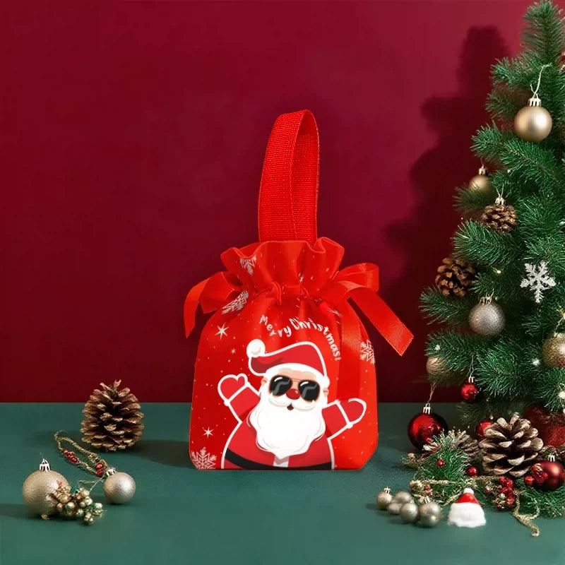 Red soft-fabric Christmas drawstring gift pouch with loop handle and Santa sample design