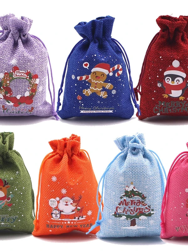 Colorful Christmas drawstring gift pouches in assorted designs