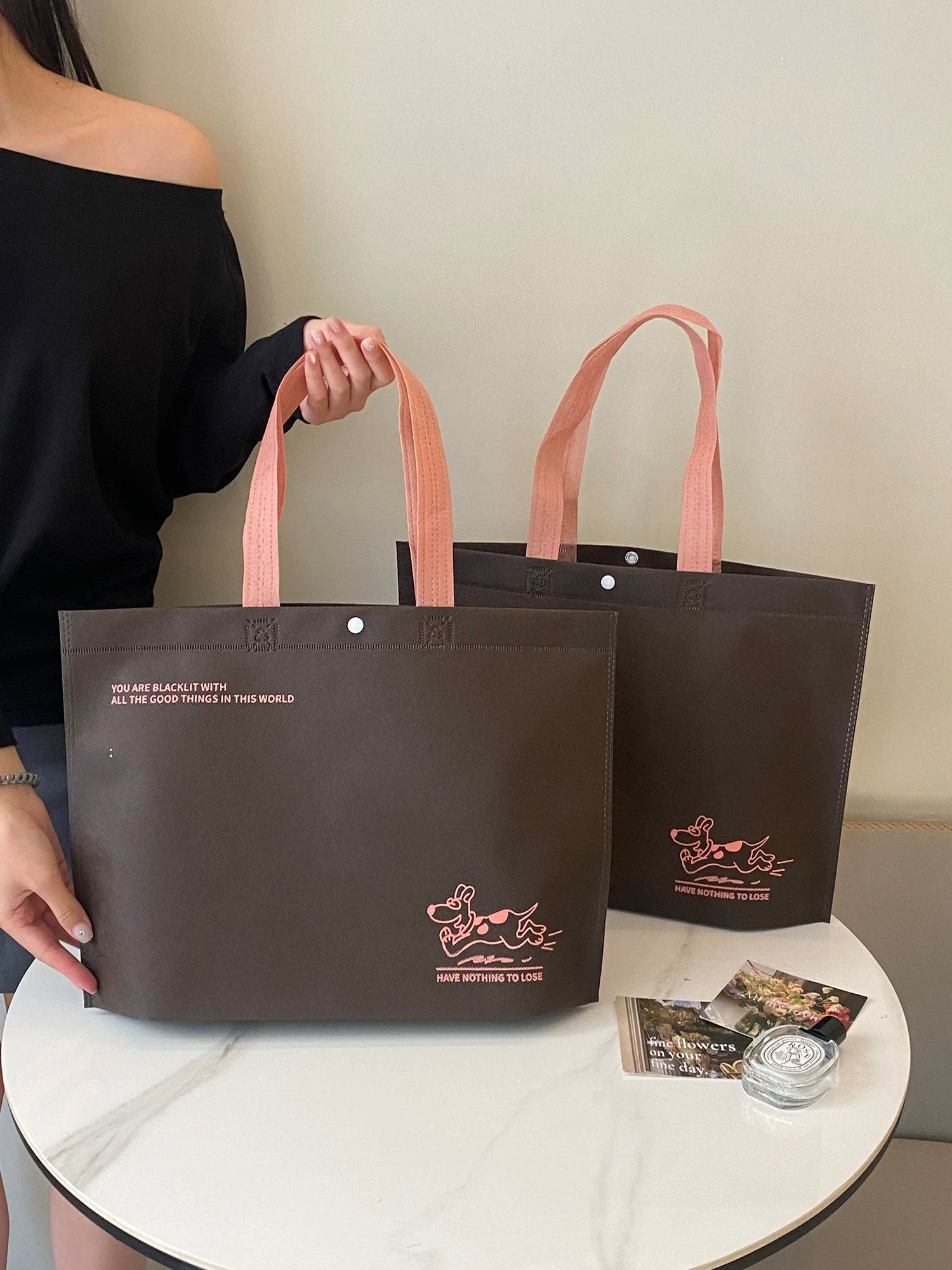 Front view of coffee brown dog-print non-woven tote bags