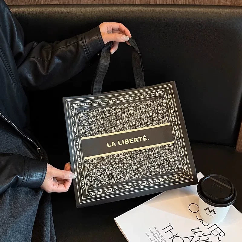 LA black printed laminated non-woven tote bag