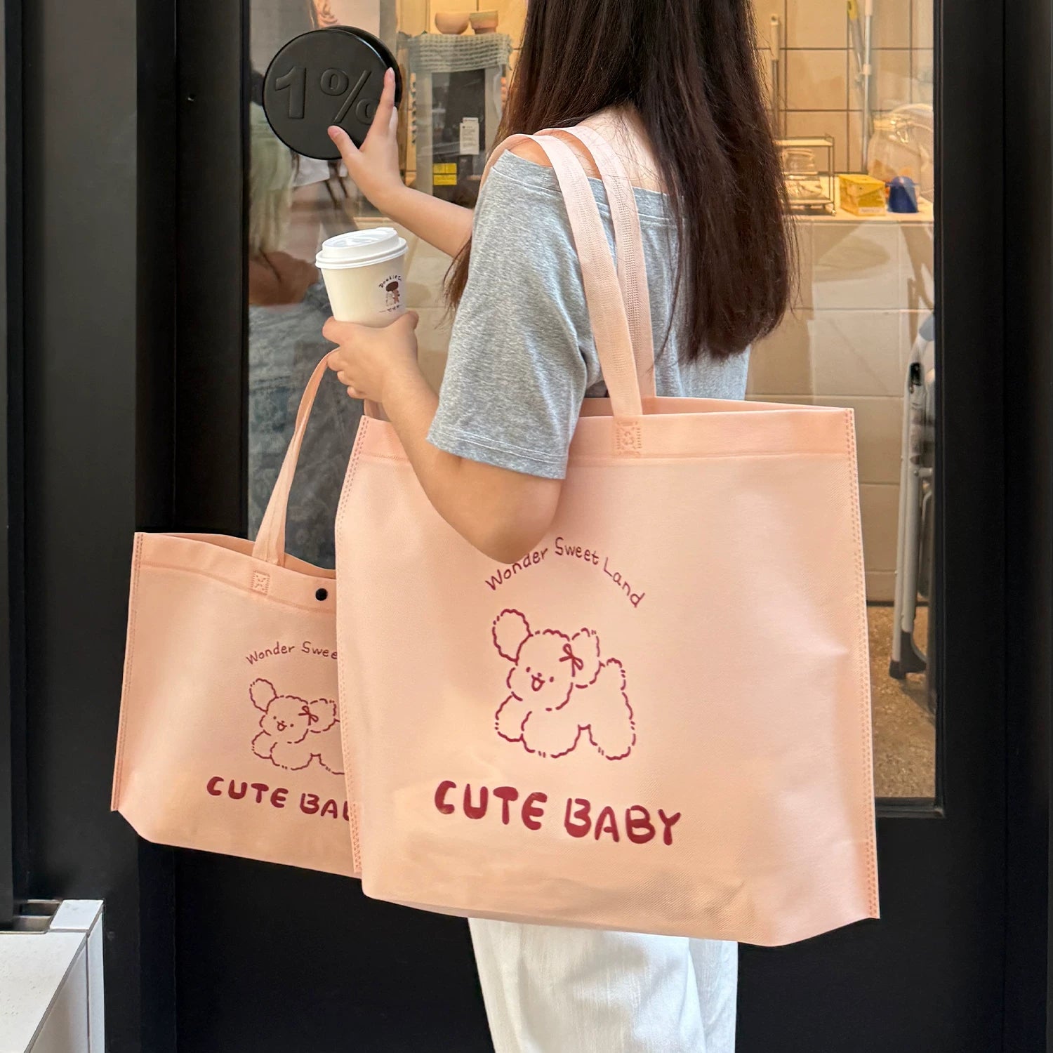 Light pink non-woven tote bag with puppy print