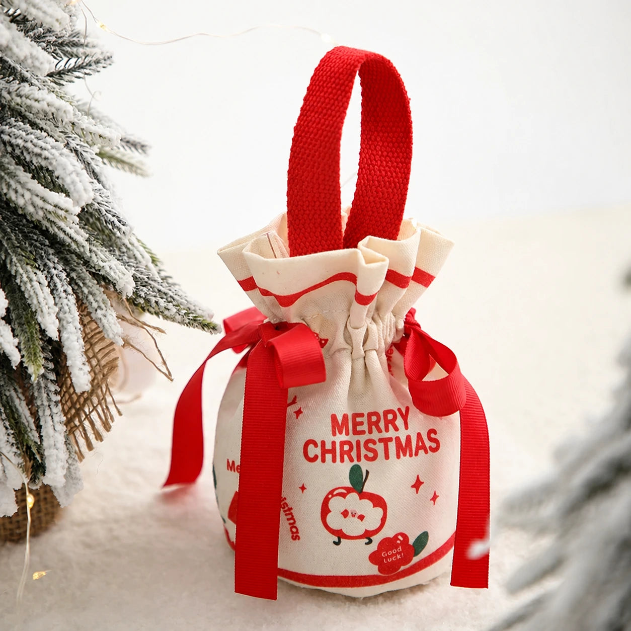 Drawstring Christmas fabric gift pouches with loop handles