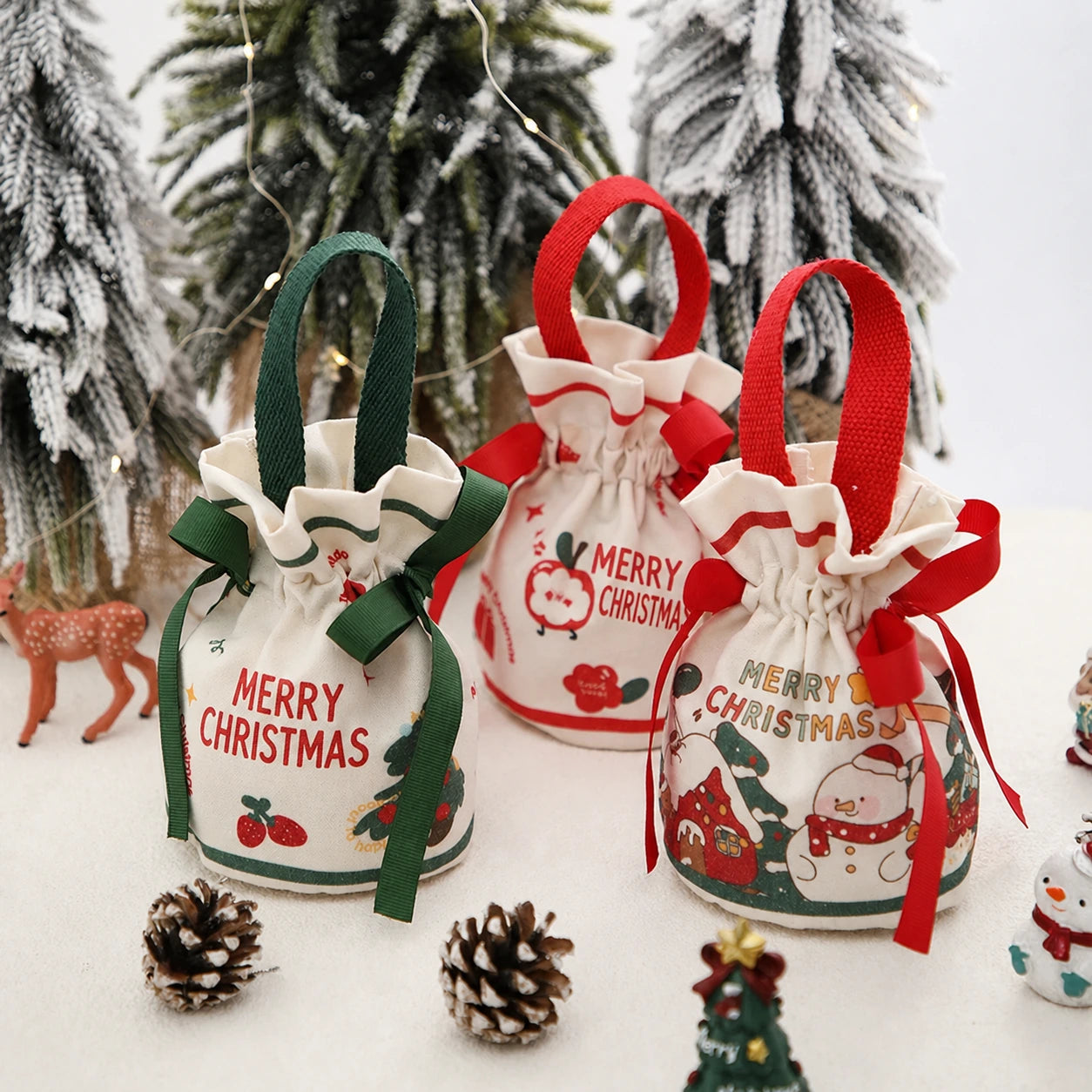 Drawstring Christmas fabric gift pouches with loop handles
