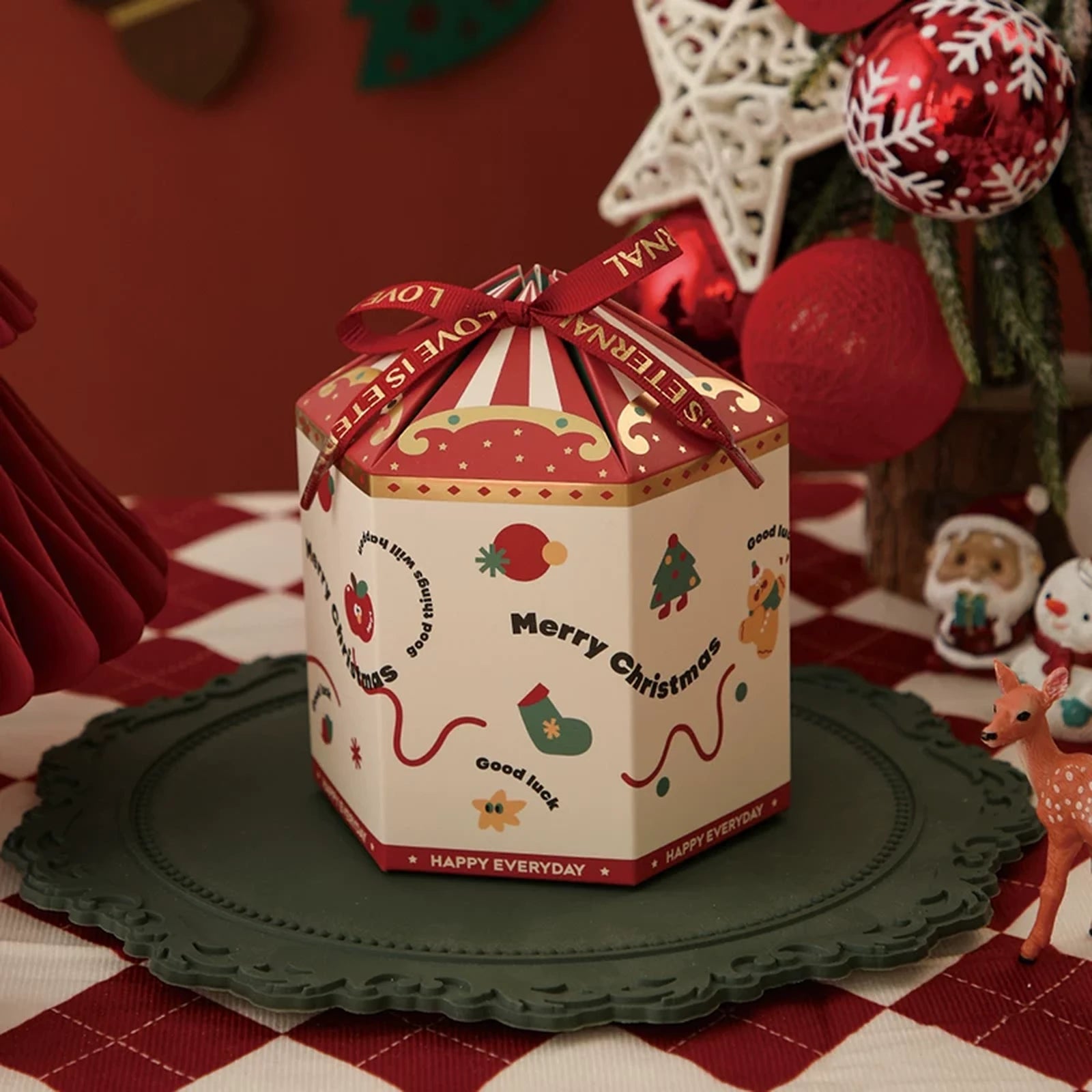 Drawstring Christmas fabric gift pouches with loop handles