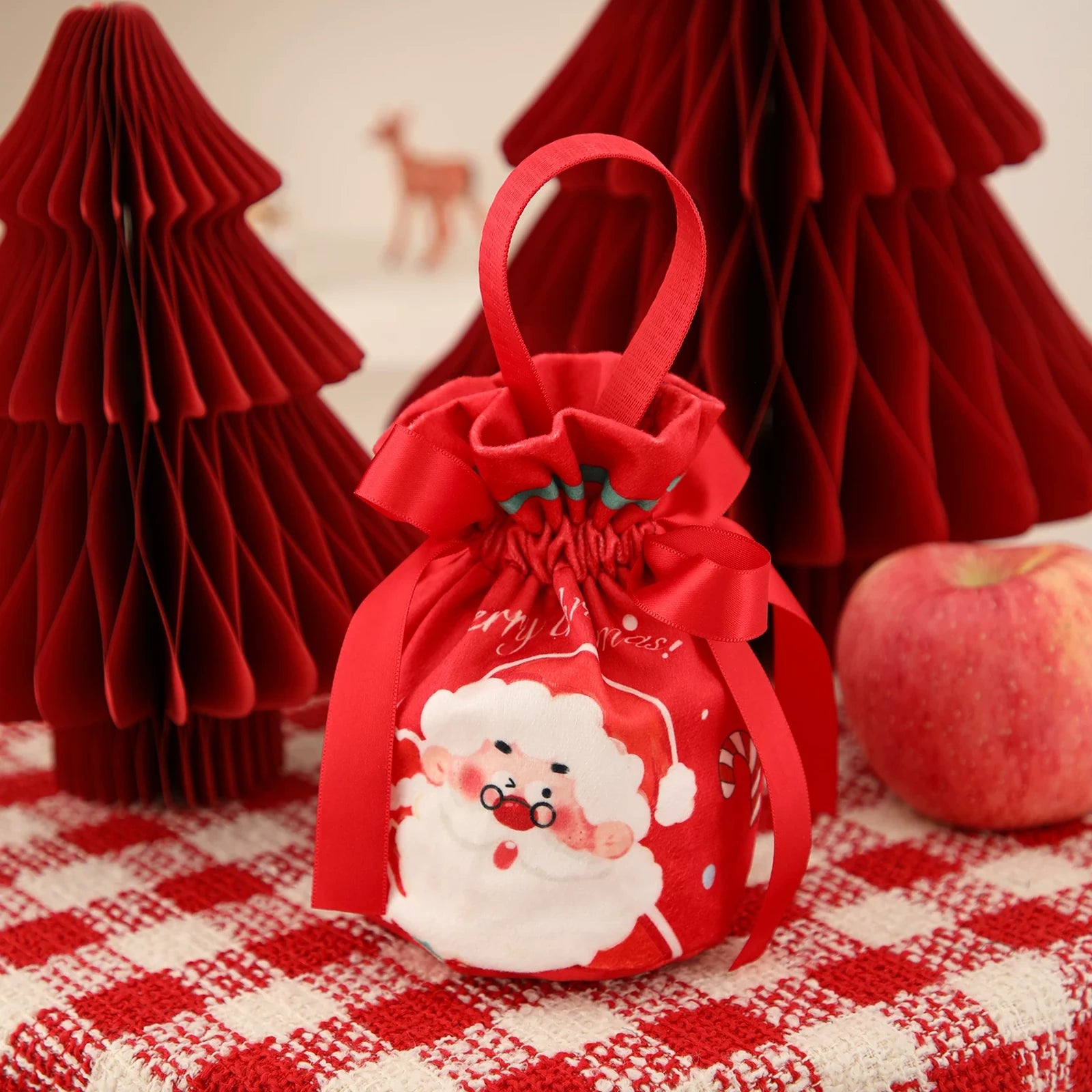 Drawstring Christmas fabric gift pouches with loop handles