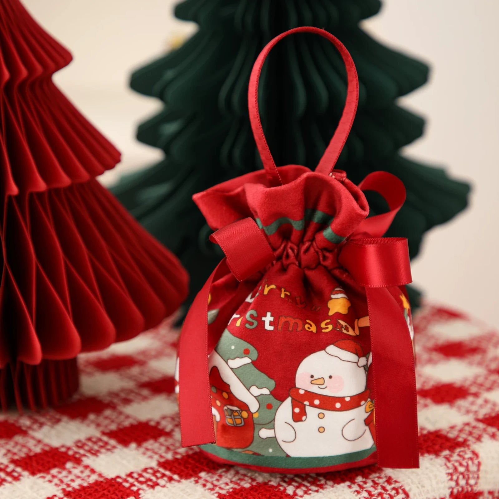 Drawstring Christmas fabric gift pouches with loop handles