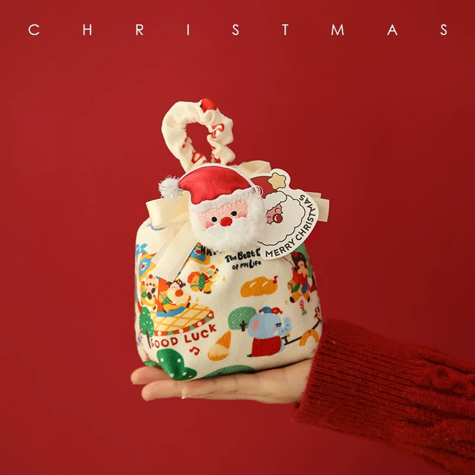Drawstring Christmas fabric gift pouches with loop handles