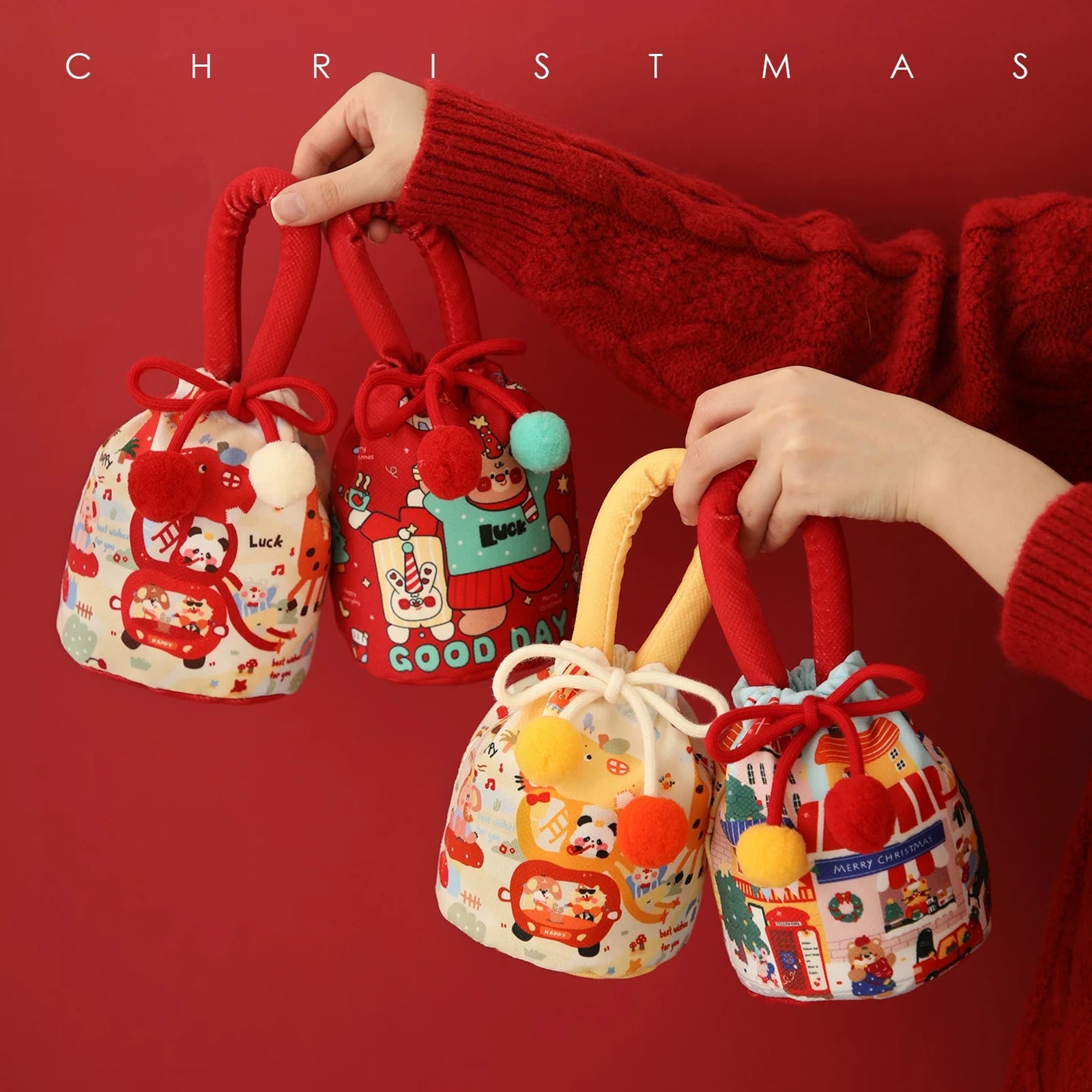 Drawstring Christmas fabric gift pouches with loop handles