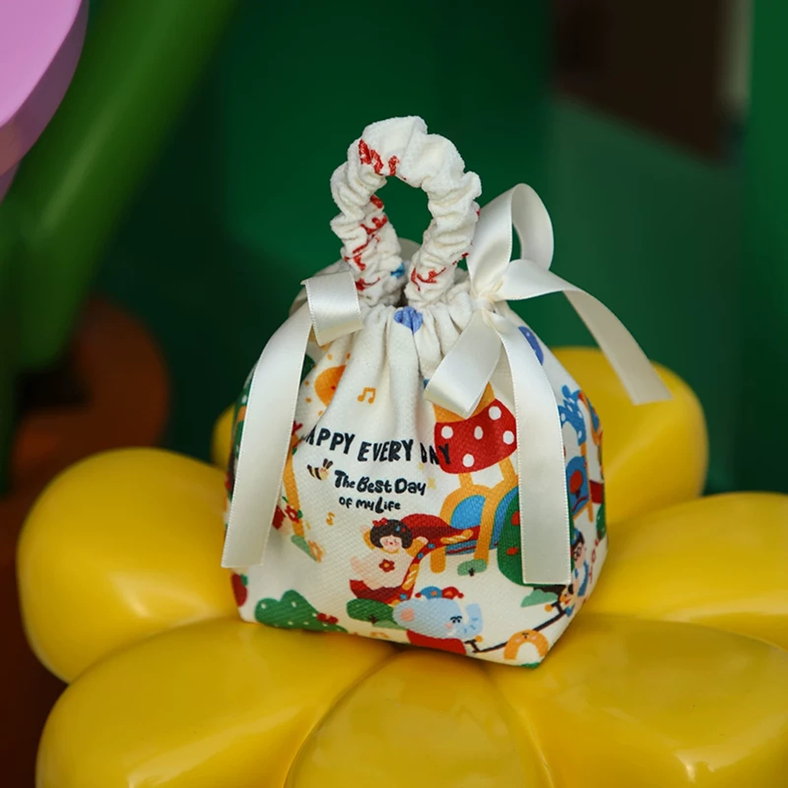 Drawstring Christmas fabric gift pouches with loop handles