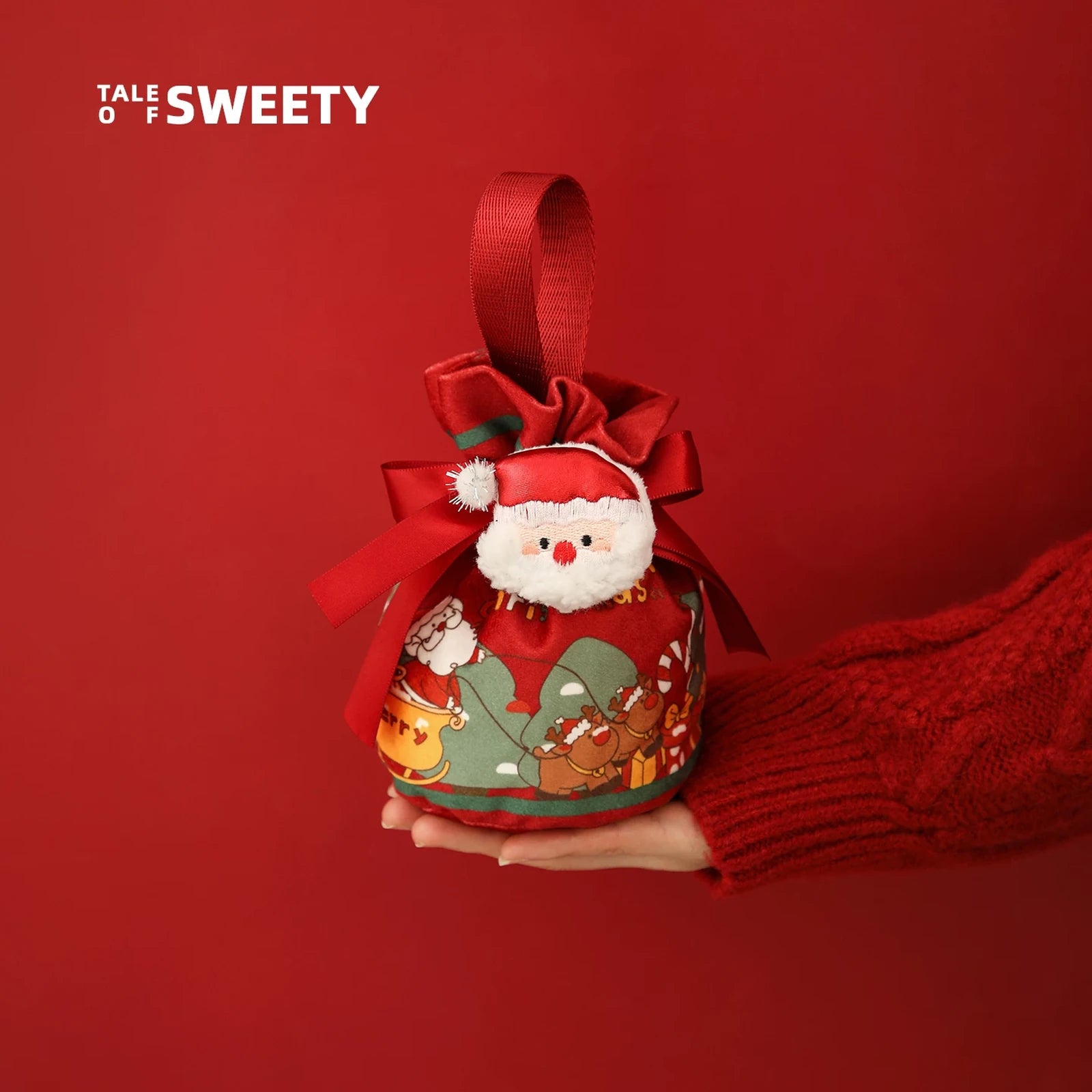 Drawstring Christmas fabric gift pouches with loop handles