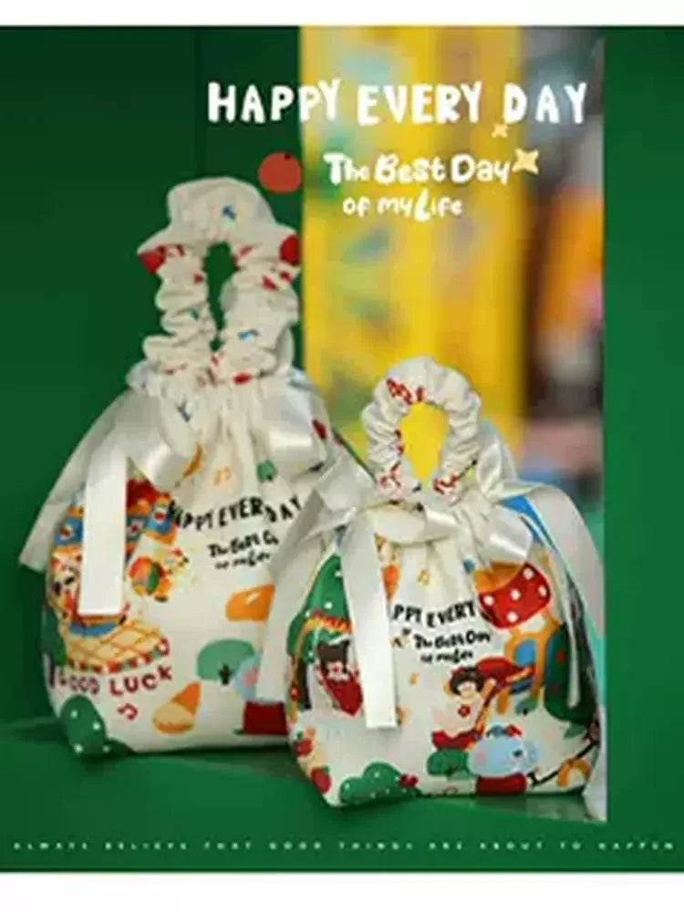 Fabric drawstring gift bags shown in two ready-stock sizes