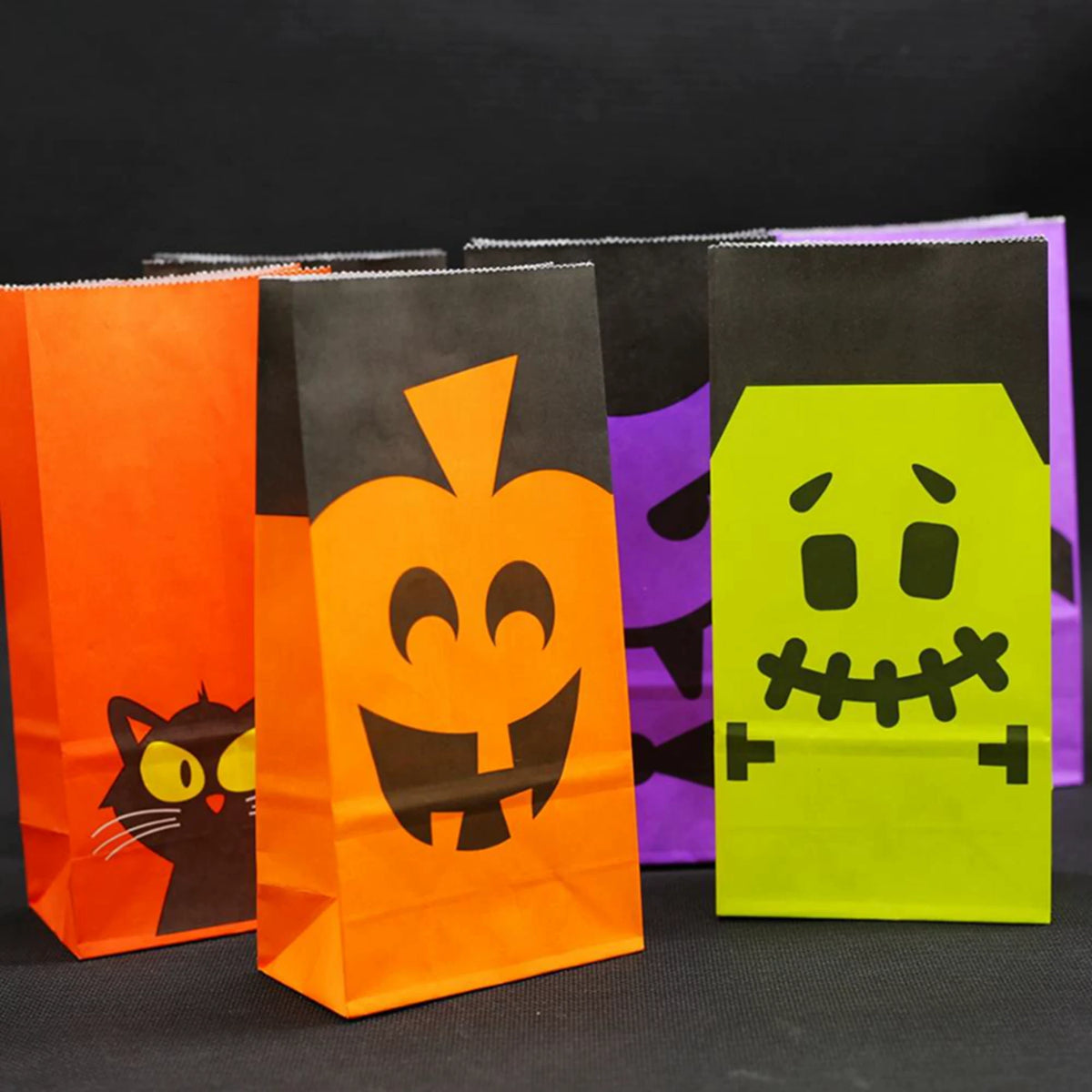 Fold-over kraft paper Halloween treat bags displayed together