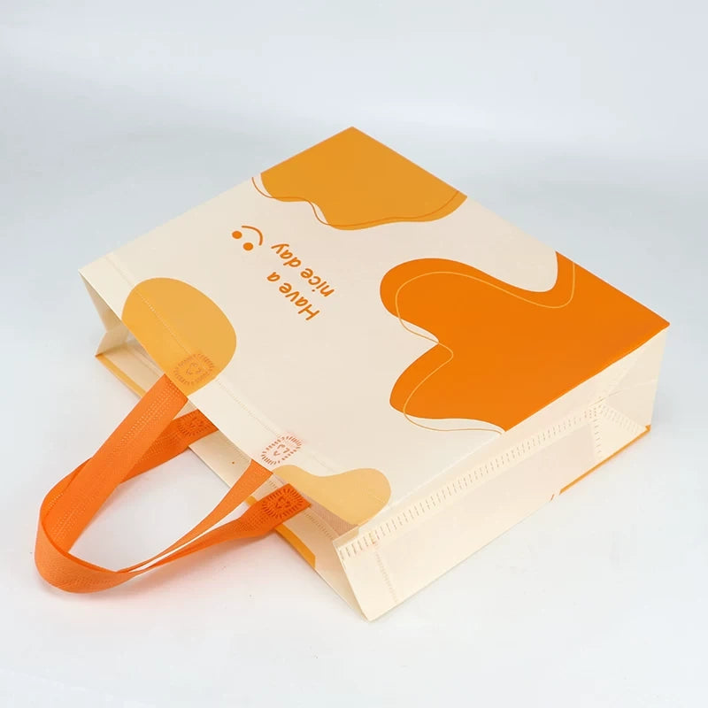 Happy orange non-woven tote bag folded view