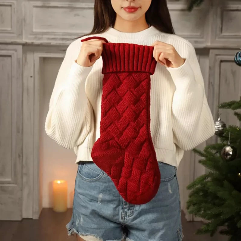 Large red knitted Christmas stocking gift bag