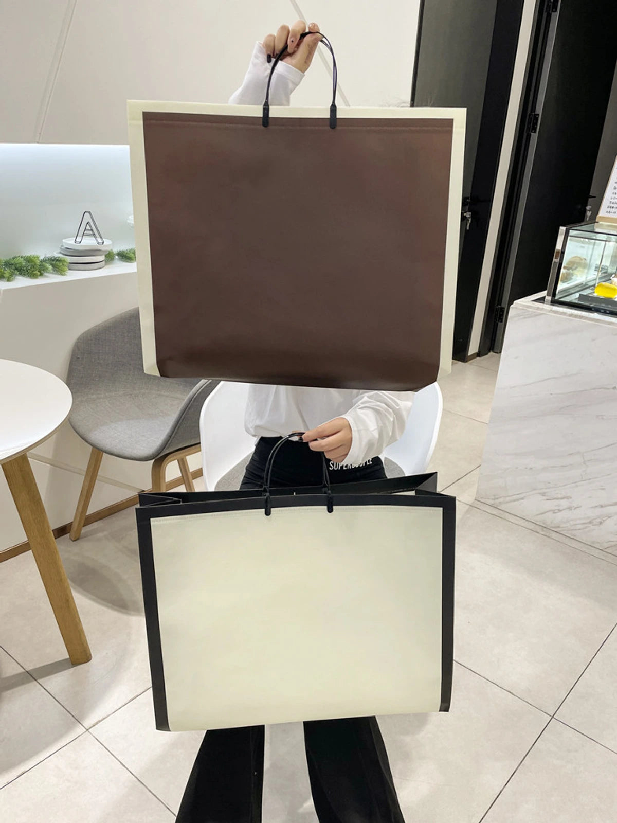 Laminated Large-Capacity Non-Woven Garment Packaging Bags — 2 Styles product view 1