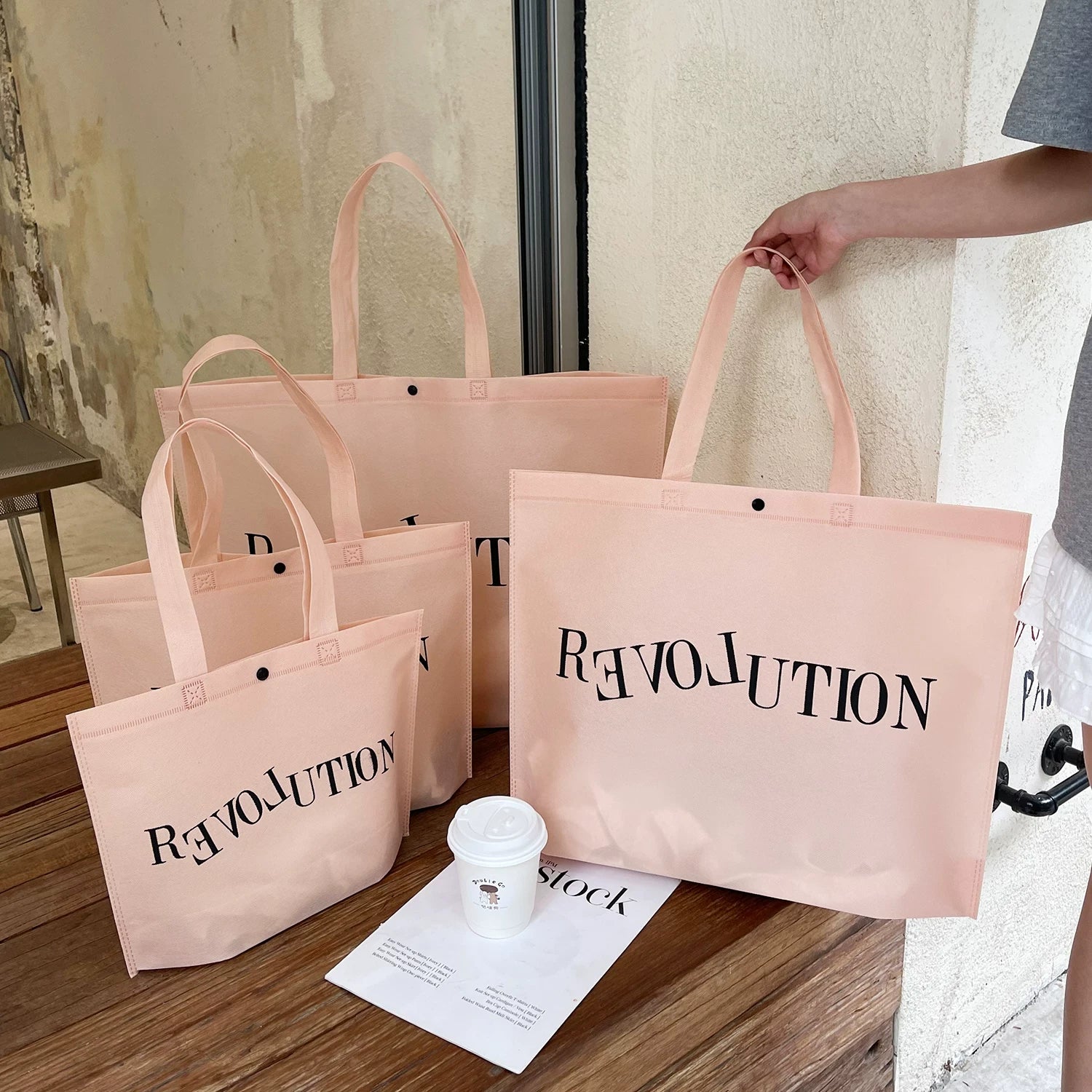 Light pink non-woven tote bag with Love print