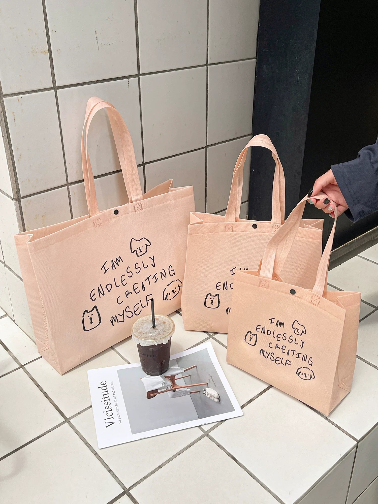 Light pink dog print non-woven tote bag size range