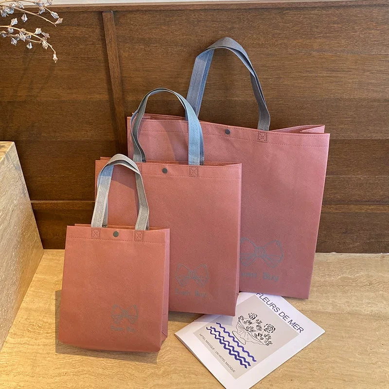 pink even buy bow non woven tote bag