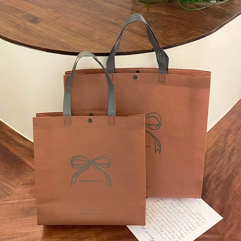 pink wishes bow non woven tote bag