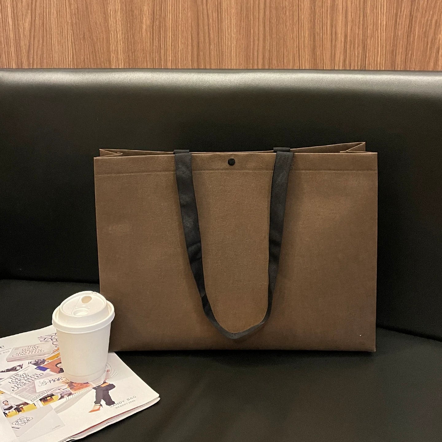 Plain brown non-woven tote bag with woven handles