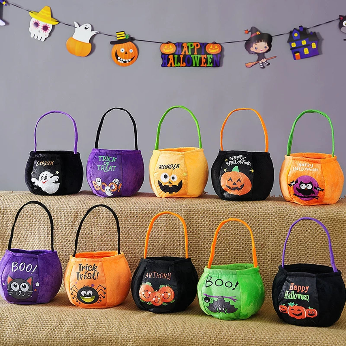Plush Halloween trick-or-treat bucket bags in assorted designs