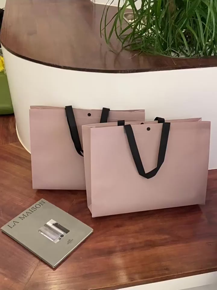 Purple shoulder and beige bear-print non-woven tote bag product video