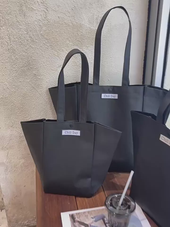 Custom trapezoid non-woven tote bag sizes, colors and woven label styles