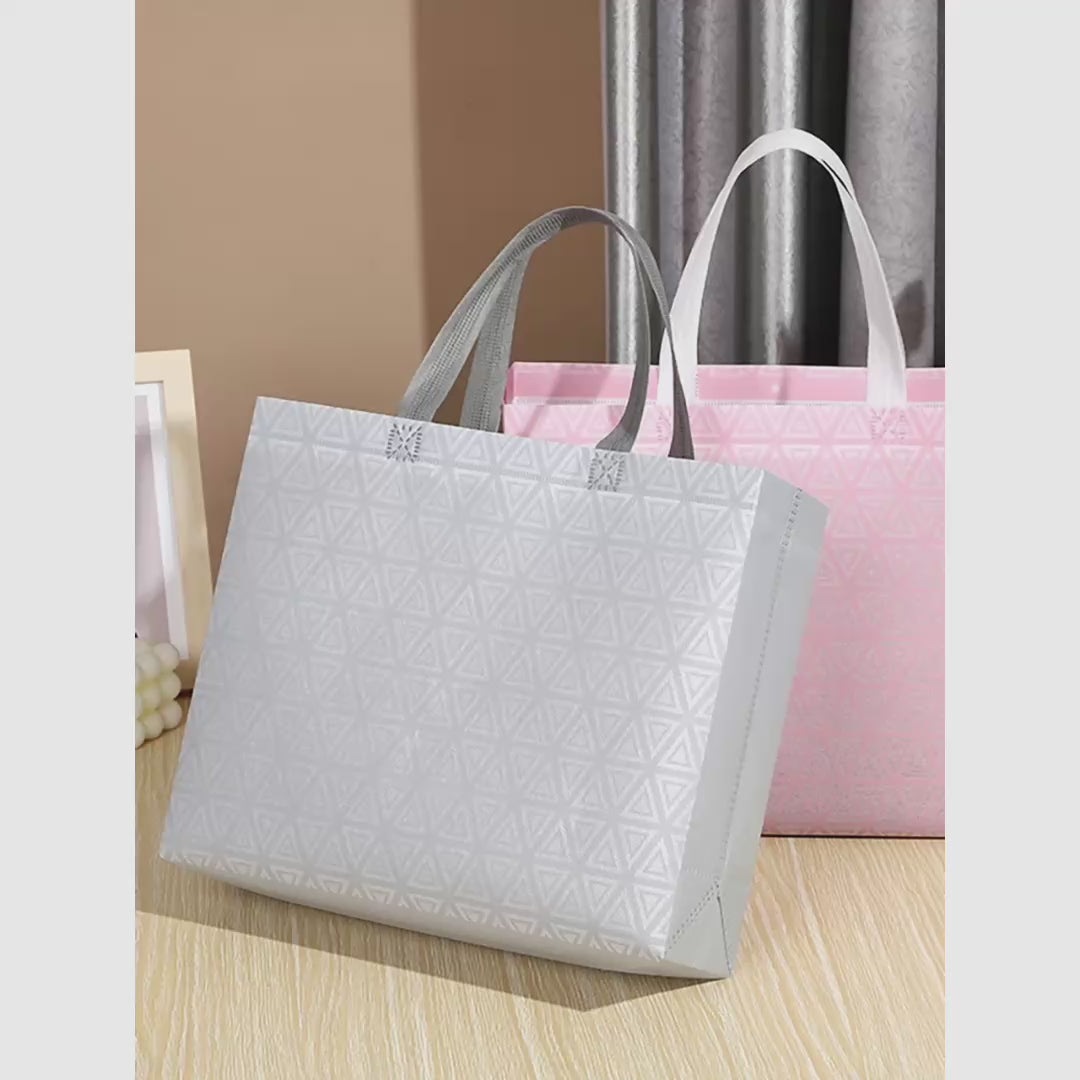 Geometric Laminated Non-Woven Tote Bags — Pink & Gray product video 1