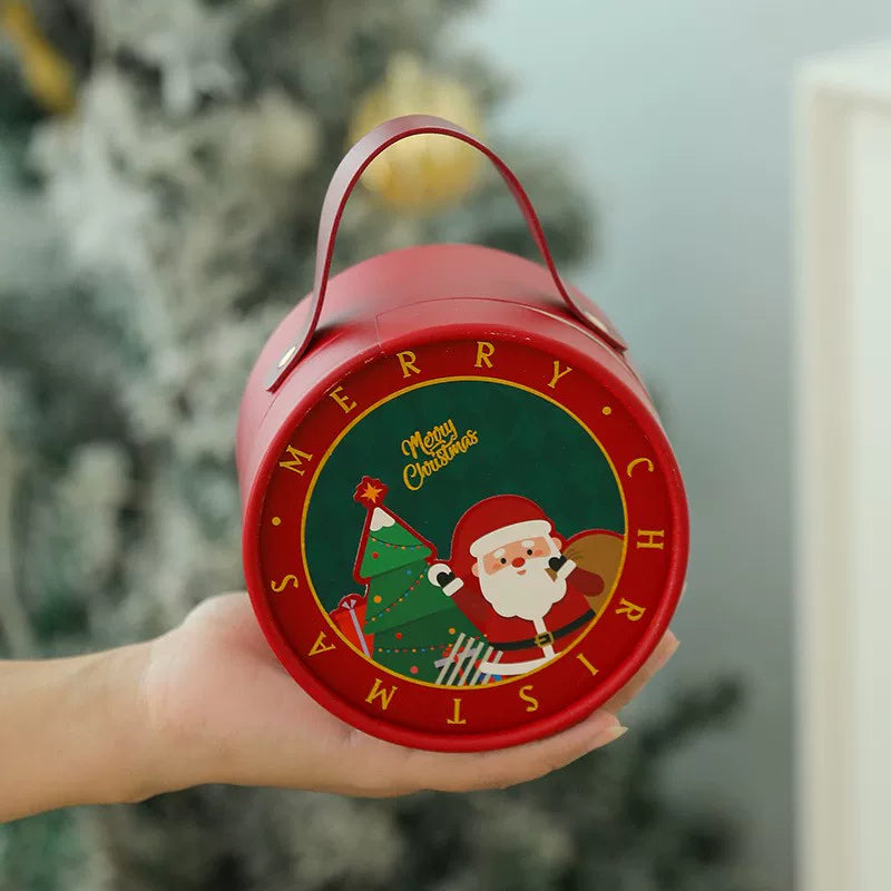 Red round Christmas apple gift box with loop handle