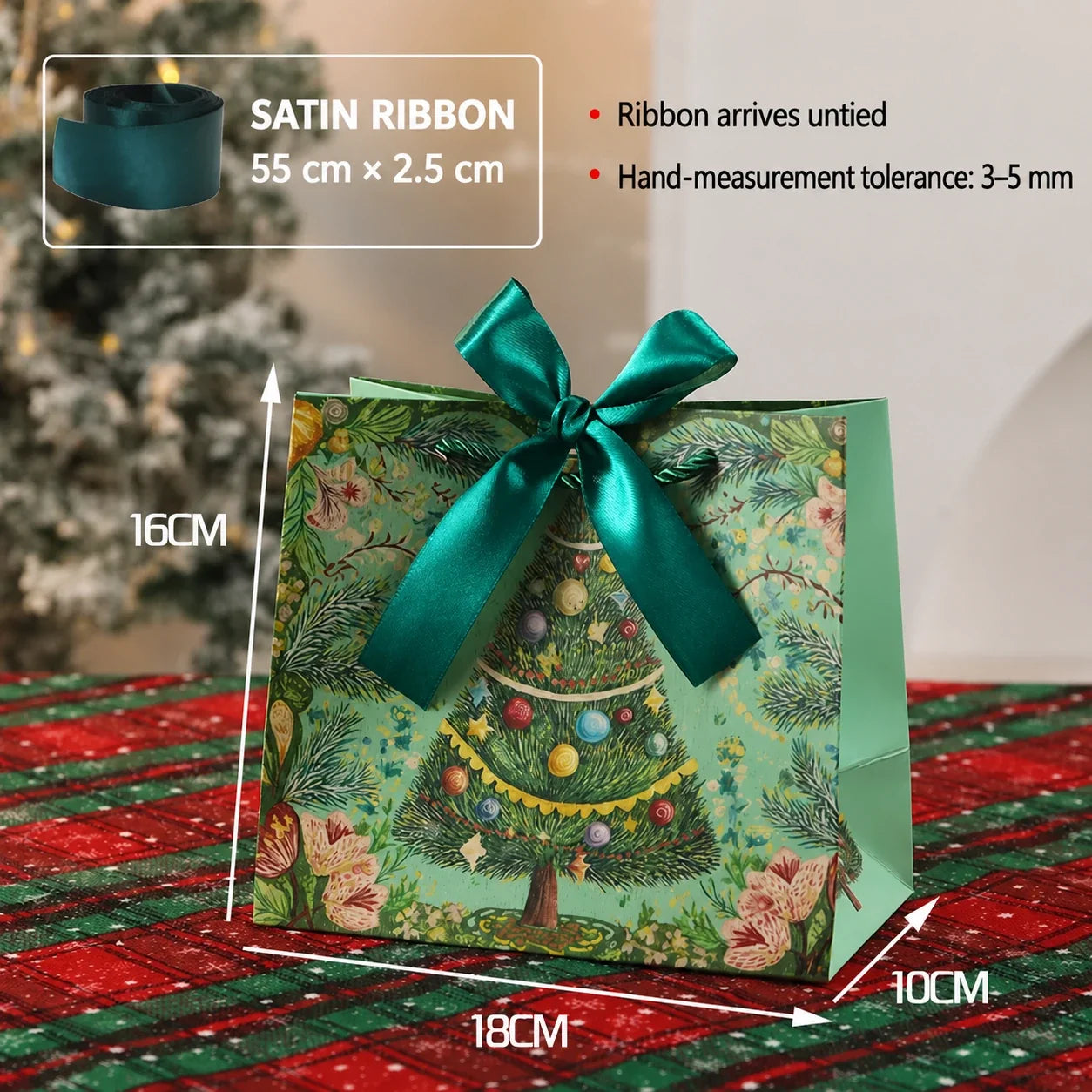 Small green Christmas paper gift bag with ribbon closure, 18 by 16 by 10 centimeters
