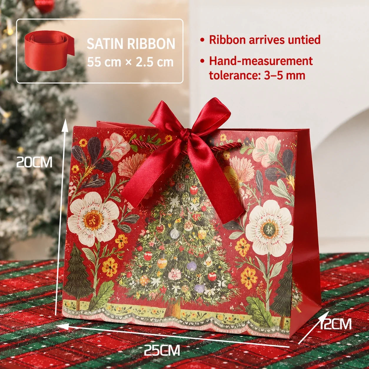Medium red Christmas paper gift bag with ribbon closure, 25 by 20 by 12 centimeters