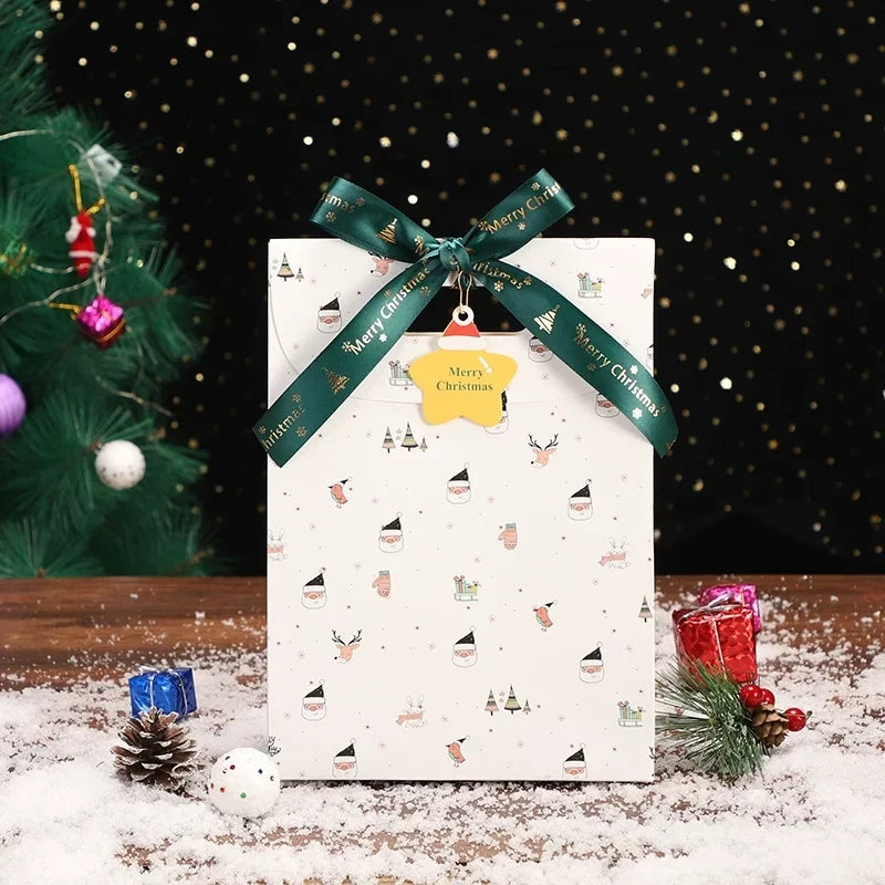 White medium Christmas paper gift bag with ribbon handle